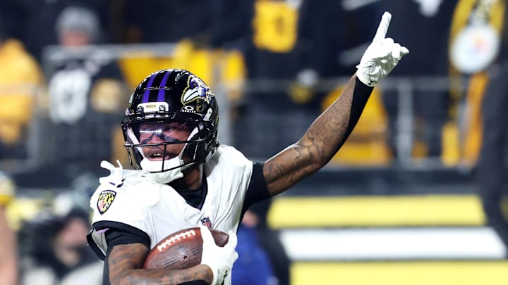Jan 4, 2026; Pittsburgh, Pennsylvania, USA; Baltimore Ravens wide receiver Zay Flowers (4) makes a touchdown catch against Pittsburgh Steelers cornerback Asante Samuel Jr. (not pictured) during the second half at Acrisure Stadium. Mandatory Credit: Charles LeClaire-Imagn Images