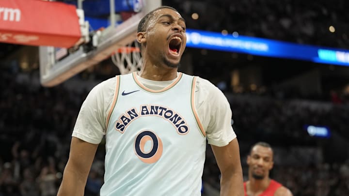Apr 13, 2025; San Antonio, Texas, USA; San Antonio Spurs forward Keldon Johnson (0) reacts after scoring during the second half against the Toronto Raptors at Frost Bank Center. Apr 13, 2025; San Antonio, Texas, USA; San Antonio Spurs forward Keldon Johnson (0) reacts after scoring during the second half against the Toronto Raptors at Frost Bank Center.