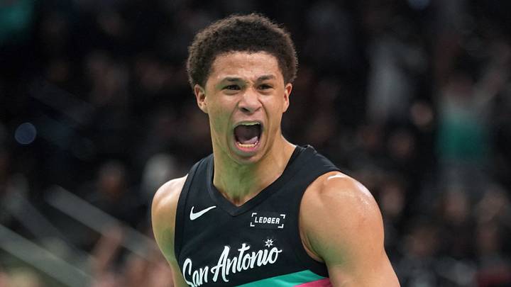 Mar 6, 2026; San Antonio, Texas, USA; San Antonio Spurs forward Carter Bryant (11) reacts after dunking during the second half against the Los Angeles Clippers at Frost Bank Center. Mandatory Credit: Scott Wachter-Imagn Images