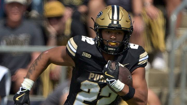 Purdue Boilermakers running back Antonio Harris (22) runs the ball. Purdue Boilermakers running back Antonio Harris (22) runs the ball.