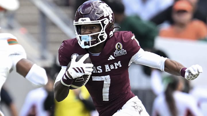 Texas A&M Aggies wide receiver KC Concepcion (7) runs the ball against the Miami Hurricanes during the second half at Kyle Field. 