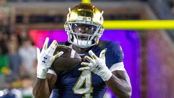 Sep 13, 2025; South Bend, Indiana, USA; Notre Dame Fighting Irish running back Jeremiyah Love (4) makes a catch in the first half against the Texas A&M Aggies at Notre Dame Stadium. Mandatory Credit: Michael Caterina-Imagn Images