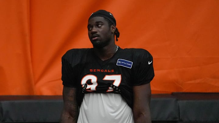 Bengals continue training camp Monday July 28, 2025. Players and coaches ran drills outside on the practice lawn until rain moved the camp to the Bengals' inside practice facility. Bengals Shemar Stewart (97) at camp.