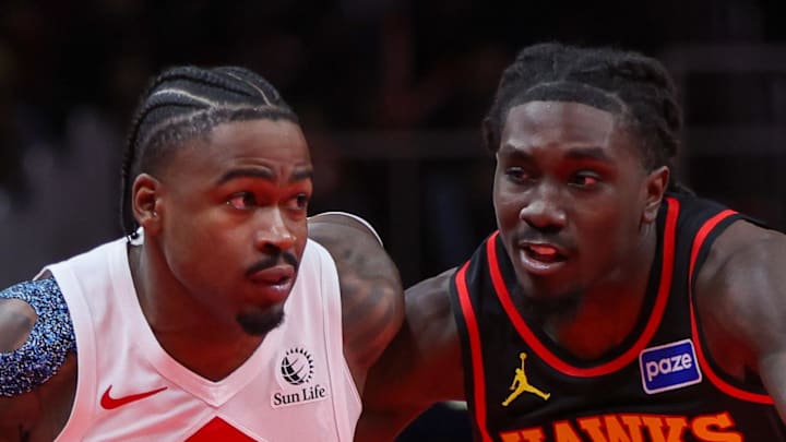 Toronto Raptors guard Jamal Shead drives on Atlanta Hawks guard Keaton Wallace.
