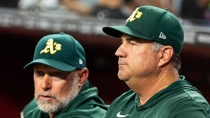 Jul 21, 2026; Phoenix, Arizona, USA; Athletics pitching coach Dan Hubbs (right) with manager Mark Kotsay against the Arizona Diamondbacks at Chase Field. Mandatory Credit: Mark J. Rebilas-Imagn Images Jul 21, 2026; Phoenix, Arizona, USA; Athletics pitching coach Dan Hubbs (right) with manager Mark Kotsay against the Arizona Diamondbacks at Chase Field. Mandatory Credit: Mark J. Rebilas-Imagn Images