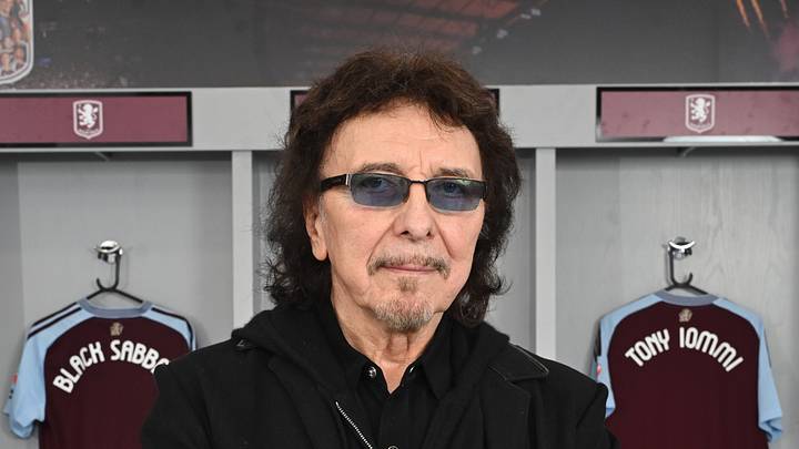 Black Sabbath's Tony Iommi stands for a photo at Aston Villa's stadium