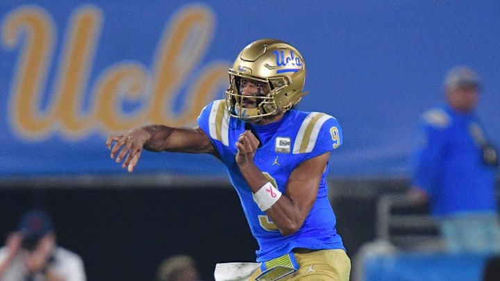Nov 8, 2025; Pasadena, California, USA; UCLA Bruins quarterback Nico Iamaleava (9) throws against the Nebraska Cornhuskers during the second half at the Rose Bowl. Mandatory Credit: Gary A. Vasquez-Imagn Images