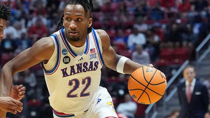 Mar 22, 2026; San Diego, CA, USA; Kansas Jayhawks guard Darryn Peterson (22) controls the ball against St. John's Red Storm guard Oziyah Sellers (4) in the second half during a second round game of the men's 2026 NCAA Tournament at Viejas Arena. Mandatory Credit: Kirby Lee-Imagn Images Mar 22, 2026; San Diego, CA, USA; Kansas Jayhawks guard Darryn Peterson (22) controls the ball against St. John's Red Storm guard Oziyah Sellers (4) in the second half during a second round game of the men's 2026 NCAA Tournament at Viejas Arena. Mandatory Credit: Kirby Lee-Imagn Images