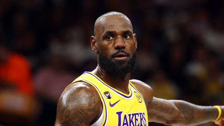 Feb 26, 2026; Phoenix, Arizona, USA; Los Angeles Lakers forward LeBron James (23) against the Phoenix Suns in the first half at Mortgage Matchup Center.