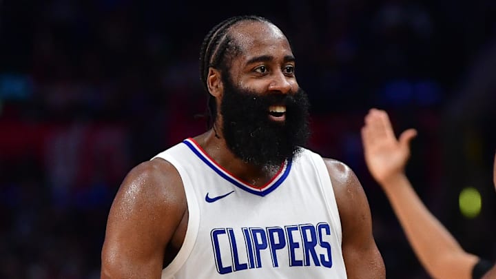 Jan 21, 2024; Los Angeles, California, USA; Los Angeles Clippers guard James Harden (1) reacts after forward Kawhi Leonard (2) scores three point basket against the Brooklyn Nets during the second half at Crypto.com Arena. Mandatory Credit: Gary A. Vasquez-Imagn Images