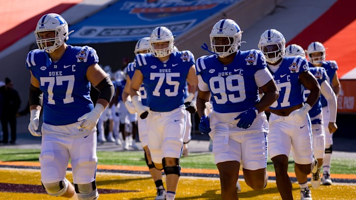 Duke football players take the field to warm up before facing Arizona State in the Tony the Tiger Sun Bowl at Sun Bowl Stadium in El Paso, Texas, on Wednesday, Dec. 31, 2025.