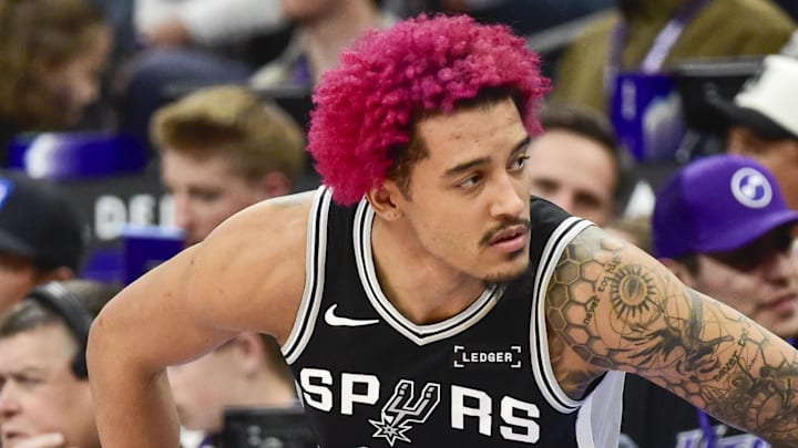 Jan 22, 2026; Salt Lake City, Utah, USA; San Antonio Spurs forward Jeremy Sochan (10) stretches before substituting in during the second half against the Utah Jazz at Delta Center. Mandatory Credit: Peter Creveling-Imagn Images