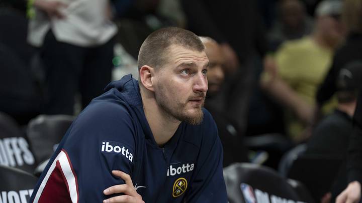 Apr 30, 2026; Minneapolis, Minnesota, USA; Denver Nuggets center Nikola Jokic (15) seats on the bench before the second half begins against the Minnesota Timberwolves during game six of the first round of the 2026 NBA Playoffs at Target Center.