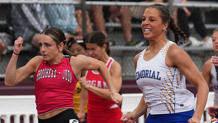 Catholic Memorial's Analena Peterson (5) wins the Division 2 girls 100-meter dash during the WIAA State Track and Field meet on Saturday, June 7, 2025 at Veterans Memorial Field in La Crosse, Wis.