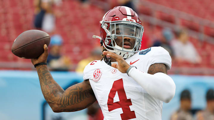 Dec 31, 2024; Tampa, FL, USA; Alabama Crimson Tide quarterback Jalen Milroe (4) throws the ball before a game against the Michigan Wolverines at Raymond James Stadium. Dec 31, 2024; Tampa, FL, USA; Alabama Crimson Tide quarterback Jalen Milroe (4) throws the ball before a game against the Michigan Wolverines at Raymond James Stadium.