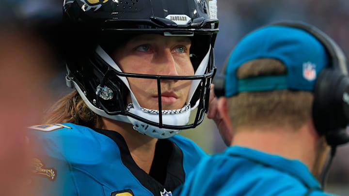 Jacksonville Jaguars quarterback Trevor Lawrence (16) looks on near head coach Liam Coen during the first quarter of an NFL football game at EverBank Stadium, Sunday, Dec. 7, 2025, in Jacksonville, Fla. The Jaguars defeated the Colts 36-19.