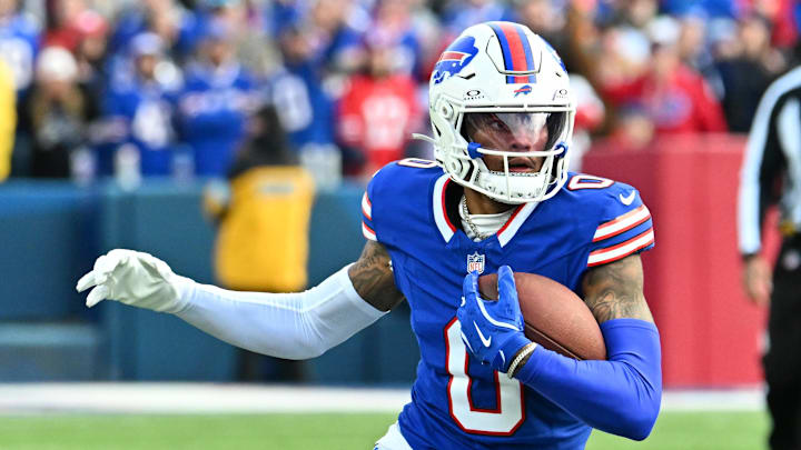 Nov 3, 2024; Orchard Park, New York, USA; Buffalo Bills wide receiver Keon Coleman (0) carries the ball after making a catch against the Miami Dolphins in the fourth quarter at Highmark Stadium. Mandatory Credit: Mark Konezny-Imagn Images