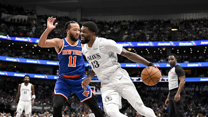 Nov 27, 2024; Dallas, Texas, USA; Dallas Mavericks forward Naji Marshall (13) drives to the basket past New York Knicks guard Jalen Brunson (11) during the second quarter at the American Airlines Center. Mandatory Credit: Jerome Miron-Imagn Images