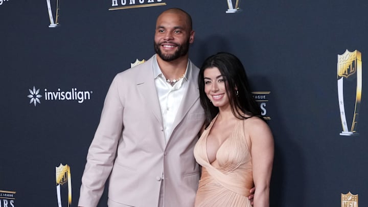Dallas Cowboys quarterback Dak Prescott and wife Sarah Jane Ramos pose on the NFL Honors Red Carpet before Super Bowl LX
