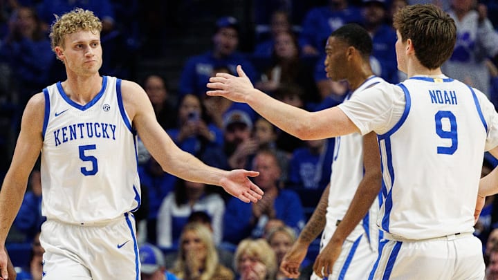 Nov 22, 2024; Lexington, Kentucky, USA; Kentucky Wildcats guard Collin Chandler (5) celebrates with forward Trent Noah (9) during the second half against the Jackson State Tigers at Rupp Arena at Central Bank Center. Mandatory Credit: Jordan Prather-Imagn Images