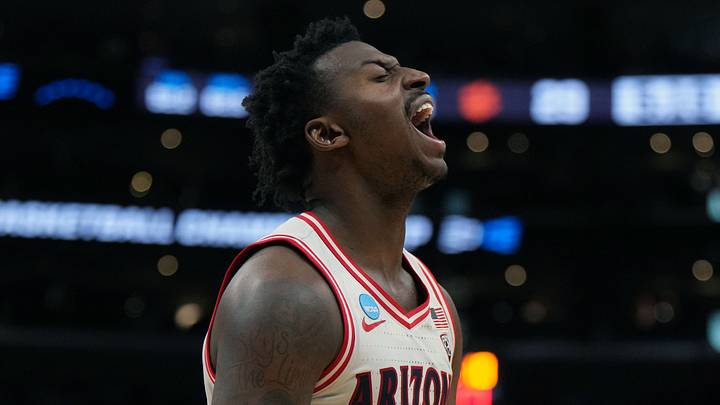 Mar 28, 2024; Los Angeles, CA, USA; Arizona Wildcats guard Jaden Bradley (0) reacts in the first half against the Clemson Tigers in the semifinals of the West Regional of the 2024 NCAA Tournament at Crypto.com Arena. Mandatory Credit: Kirby Lee-USA TODAY Sports