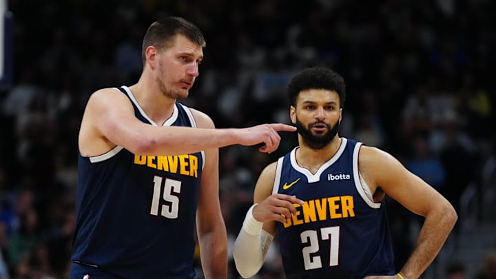Apr 10, 2024; Denver, Colorado, USA; Denver Nuggets center Nikola Jokic (15) and guard Jamal Murray (27) talk in the fourth quarter against the Minnesota Timberwolves at Ball Arena. Apr 10, 2024; Denver, Colorado, USA; Denver Nuggets center Nikola Jokic (15) and guard Jamal Murray (27) talk in the fourth quarter against the Minnesota Timberwolves at Ball Arena.