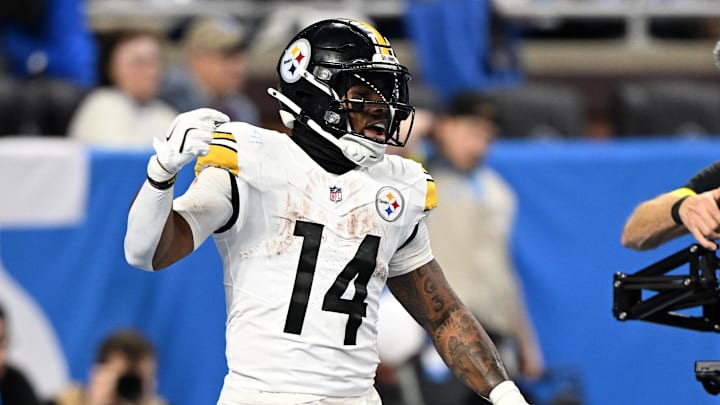 Dec 21, 2025; Detroit, Michigan, USA; Pittsburgh Steelers running back Kenneth Gainwell (14) celebrates after a touchdown during the third quarter against the Detroit Lions at Ford Field. Mandatory Credit: Lon Horwedel-Imagn Images