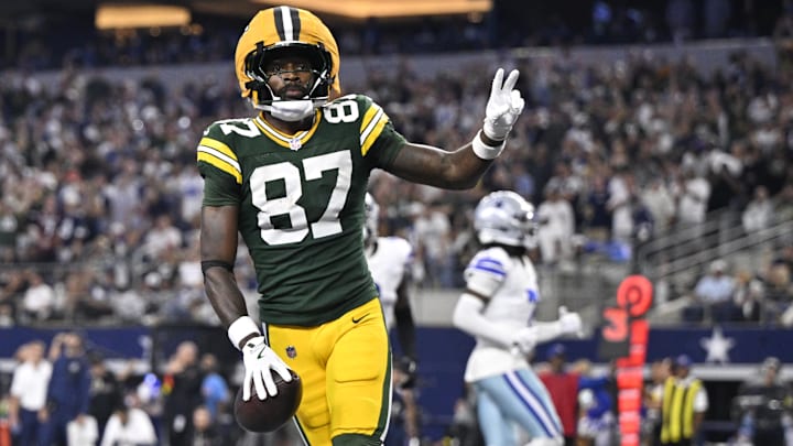 Green Bay Packers wide receiver Romeo Doubs (87) celebrates after scoring a touchdown against the Dallas Cowboys in the fourth quarter at AT&T Stadium.