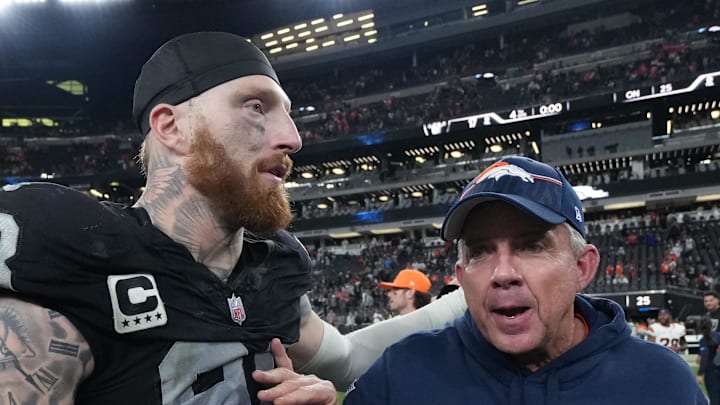 Dec 7, 2025; Paradise, Nevada, USA;  Las Vegas Raiders defensive end Maxx Crosby (98) and Denver Broncos head coach Sean Payton meet on the field following a game at Allegiant Stadium. Mandatory Credit: Kirby Lee-Imagn Images