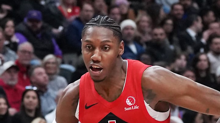 Toronto Raptors forward RJ Barrett drives against Minnesota Timberwolves forward Julius Randle.