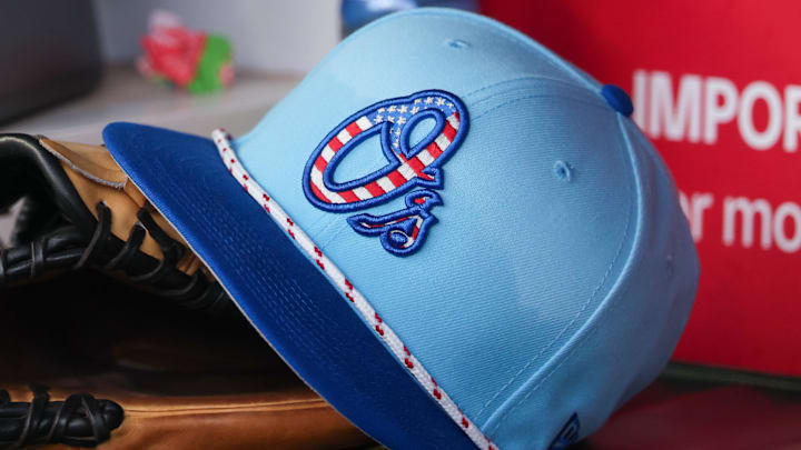 Jul 4, 2025; Atlanta, Georgia, USA; A detailed view of the Baltimore Orioles 4th of July hat in the dugout against the Atlanta Braves in the third inning at Truist Park. Mandatory Credit: Brett Davis-Imagn Images