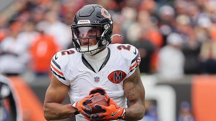 Nov 2, 2025; Cincinnati, Ohio, USA; Chicago Bears wide receiver DJ Moore (2) runs with the ball against the Cincinnati Bengals during the first quarter at Paycor Stadium. Mandatory Credit: Joseph Maiorana-Imagn Images