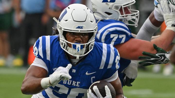 Sep 5, 2026; Durham, North Carolina, USA; Duke Blue Devils running back Nate Sheppard (20) runs the ball past the Tulane Green Wave defense during the first quarter at Wallace Wade Stadium. Mandatory Credit: Zachary Taft-Imagn Images Sep 5, 2026; Durham, North Carolina, USA; Duke Blue Devils running back Nate Sheppard (20) runs the ball past the Tulane Green Wave defense during the first quarter at Wallace Wade Stadium. Mandatory Credit: Zachary Taft-Imagn Images