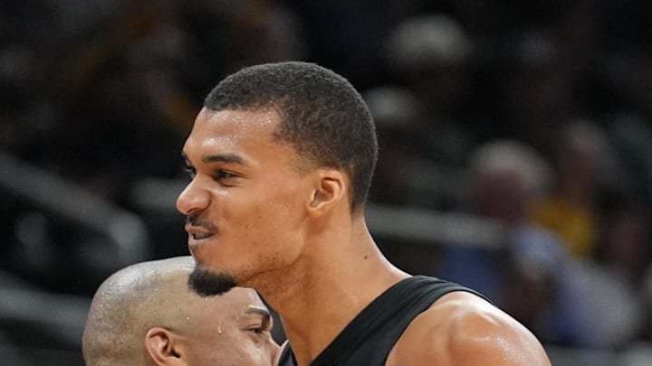San Antonio Spurs forwards Keldon Johnson (3) and forward Victor Wembanyama (1) celebrate in the second half against the Sacramento Kings at Moody Center on Feb 21, 2026. San Antonio Spurs forwards Keldon Johnson (3) and forward Victor Wembanyama (1) celebrate in the second half against the Sacramento Kings at Moody Center on Feb 21, 2026.