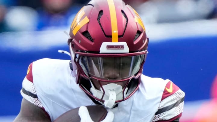 Washington Commanders running back Jacory Croskey-Merritt runs against the Giants defense. Washington Commanders running back Jacory Croskey-Merritt runs against the Giants defense.