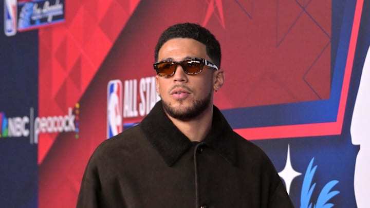 Feb 15, 2026; Los Angeles, CA, USA; Team USA Stars guard Devin Booker (1) of the Phoenix Suns on the red carpet before the 75th NBA All Star Game at Intuit Dome. Mandatory Credit: Jayne Kamin-Oncea-Imagn Images