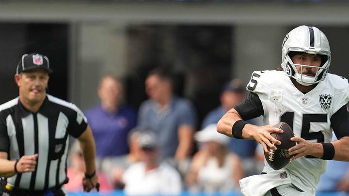 Sep 8, 2024; Inglewood, California, USA; Las Vegas Raiders quarterback Gardner Minshew (15) runs with the ball against the Los Angeles Chargers in the second half at SoFi Stadium. Mandatory Credit: Kirby Lee-Imagn Images
