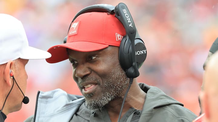 Dec 7, 2025; Tampa, Florida, USA; Tampa Bay Buccaneers head coach Todd Bowles talks with referee Clete Blakeman (34) during the first quarter against the New Orleans Saints at Raymond James Stadium. Mandatory Credit: Kim Klement Neitzel-Imagn Images