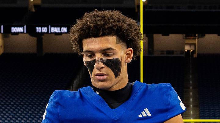 Detroit Catholic Central wide receiver Samson Gash (5) and teammate Hunter Stokes (86) shake hands with Detroit King players before the start of the 2025 Prep Bowl at Ford Field in Detroit on Saturday, Oct. 25, 2025. Detroit Catholic Central wide receiver Samson Gash (5) and teammate Hunter Stokes (86) shake hands with Detroit King players before the start of the 2025 Prep Bowl at Ford Field in Detroit on Saturday, Oct. 25, 2025.