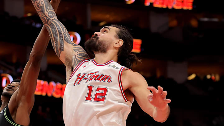 Jan 18, 2026; Houston, Texas, USA; Houston Rockets center Steven Adams (12) rebounds against the New Orleans Pelicans during the third quarter at Toyota Center. Mandatory Credit: Erik Williams-Imagn Images