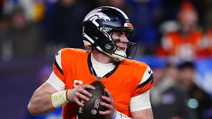 Jan 17, 2026; Denver, CO, USA; Denver Broncos quarterback Bo Nix (10) drops to throw during the fourth quarter of an AFC Divisional Round playoff game against the Buffalo Bills at Empower Field at Mile High. Mandatory Credit: Ron Chenoy-Imagn Images