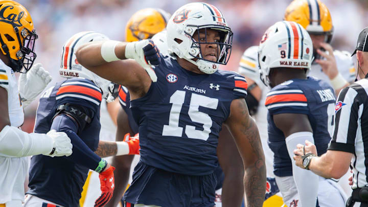 Auburn Tigers defensive lineman Keldric Faulk celebrates a stop as Auburn Tigers take on California Golden Bears.