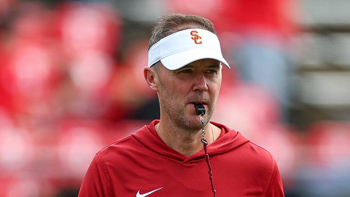 Sep 19, 2026; Piscataway, New Jersey, USA; USC Trojans head coach Lincoln Riley on the field during warm ups before the game against the Rutgers Scarlet Knights at SHI Stadium. Sep 19, 2026; Piscataway, New Jersey, USA; USC Trojans head coach Lincoln Riley on the field during warm ups before the game against the Rutgers Scarlet Knights at SHI Stadium.