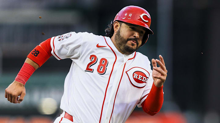 Cincinnati Reds designated hitter Eugenio Suarez (28) scores