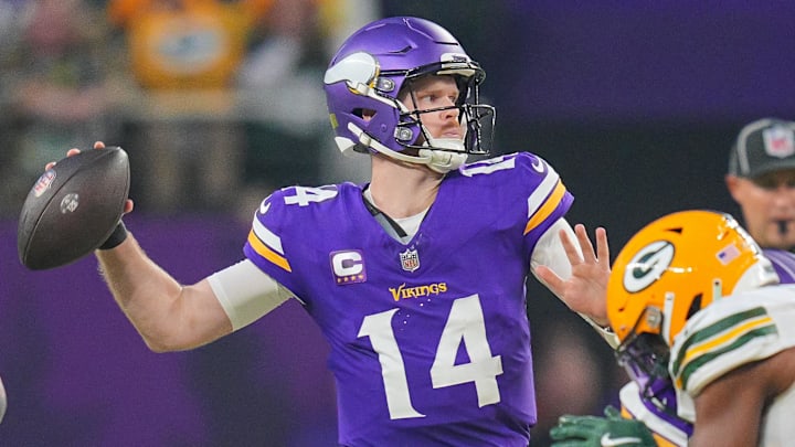 Dec 29, 2024; Minneapolis, Minnesota, USA; Minnesota Vikings quarterback Sam Darnold (14) passes against Green Bay Packers in the second quarter at U.S. Bank Stadium. Dec 29, 2024; Minneapolis, Minnesota, USA; Minnesota Vikings quarterback Sam Darnold (14) passes against Green Bay Packers in the second quarter at U.S. Bank Stadium.