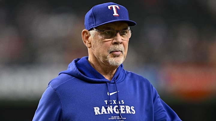 Aug 21, 2024; Arlington, Texas, USA; Texas Rangers manager Bruce Bochy (15) walks back to the dugout during the seventh inning against the Pittsburgh Pirates at Globe Life Field