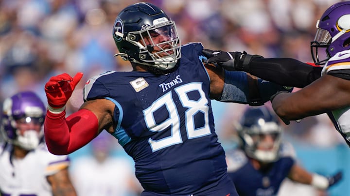 Tennessee Titans defensive tackle Jeffery Simmons (98) tries to guard against the Minnesota Vikings’ pass during the first quarter at Nissan Stadium in Nashville, Tenn., Sunday, Nov. 17, 2024. Tennessee Titans defensive tackle Jeffery Simmons (98) tries to guard against the Minnesota Vikings’ pass during the first quarter at Nissan Stadium in Nashville, Tenn., Sunday, Nov. 17, 2024.