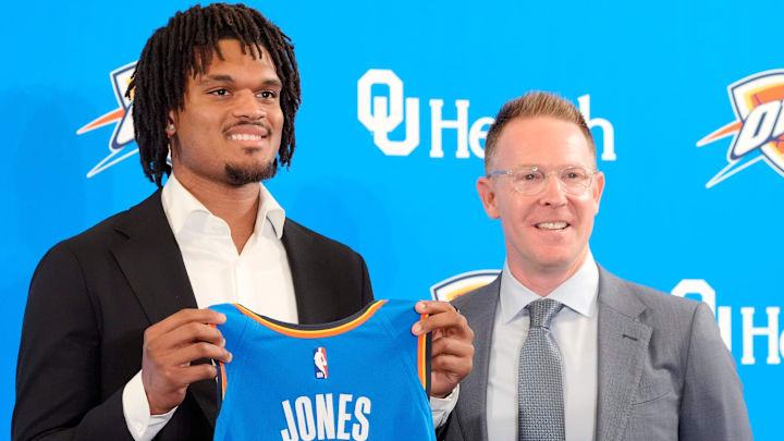 Dillon Jones stands with Thunder general manager Sam Presti during an introductory press conference for the 2024 Thunder draft picks at Oklahoma Contemporary Arts Center in Oklahoma City, Saturday, June, 29, 2024.