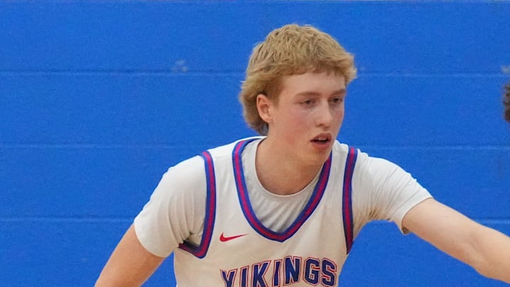 Wisconsin Lutheran's Kager Knueppel (1) guards Slinger's Jack Kohnen (3) during the game at Wisconsin Lutheran High School, in Milwaukee, Wisconsin, Dec. 9, 2025. Wisconsin Lutheran won the game, 68-46.