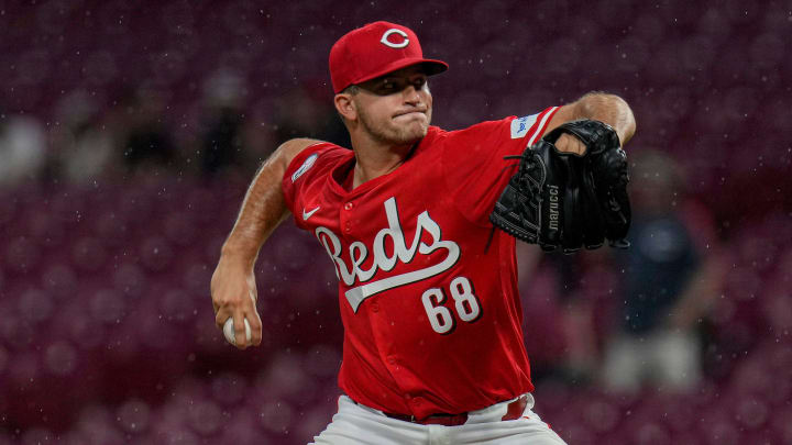 Cincinnati Reds pitcher Carson Spiers (68) throws to the San Diego Padres as thunderstorms make their way to Great American Ball Park in Cincinnati Wednesday, May 22, 2024.